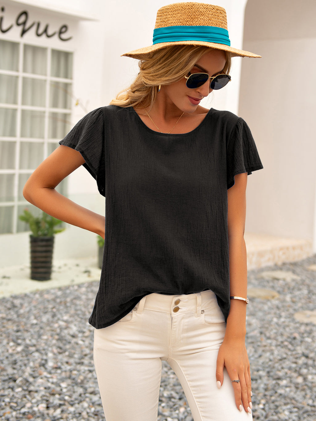 Blusa de verano con espalda abierta y lazo anudado 