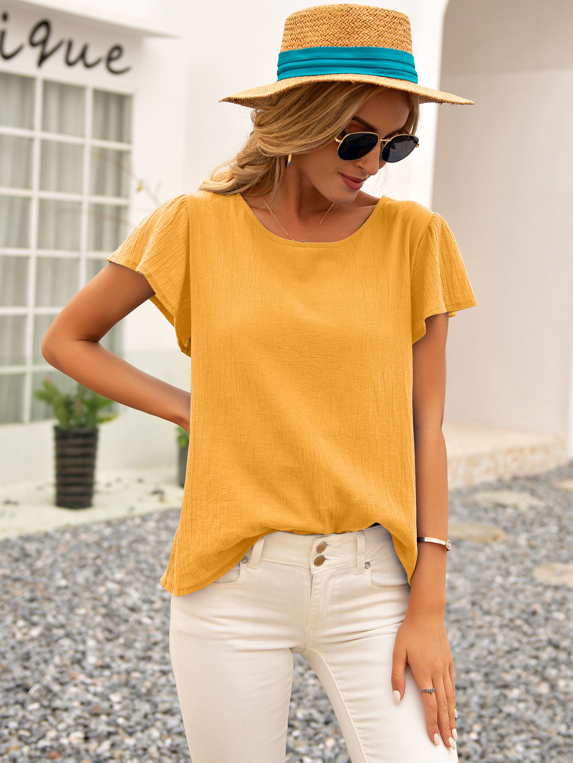 Blusa de verano con espalda abierta y lazo anudado 