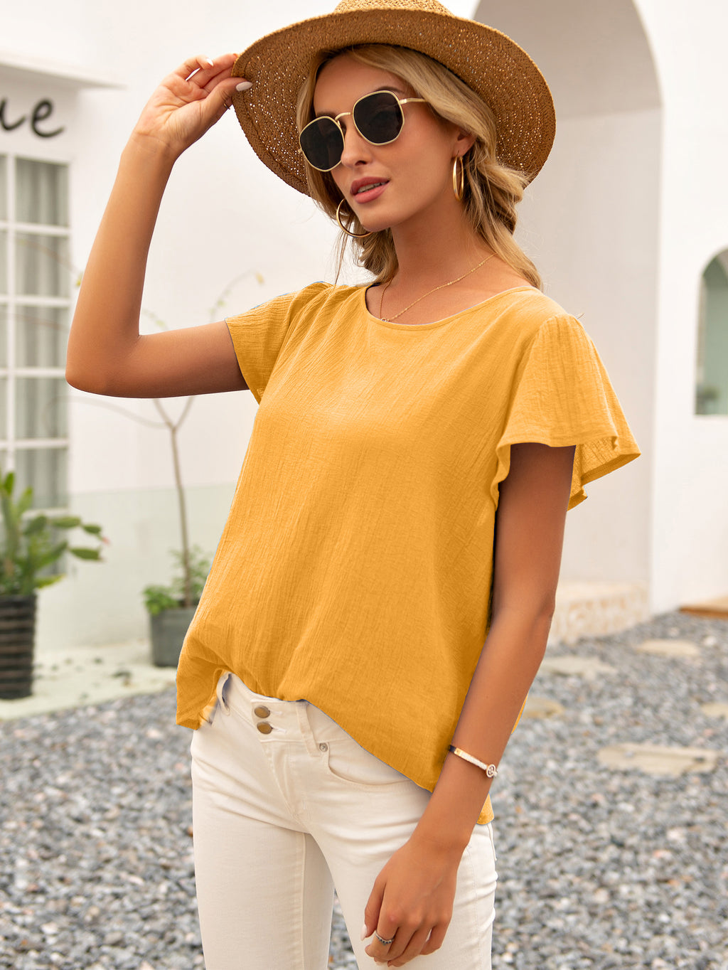 Blusa de verano con espalda abierta y lazo anudado 