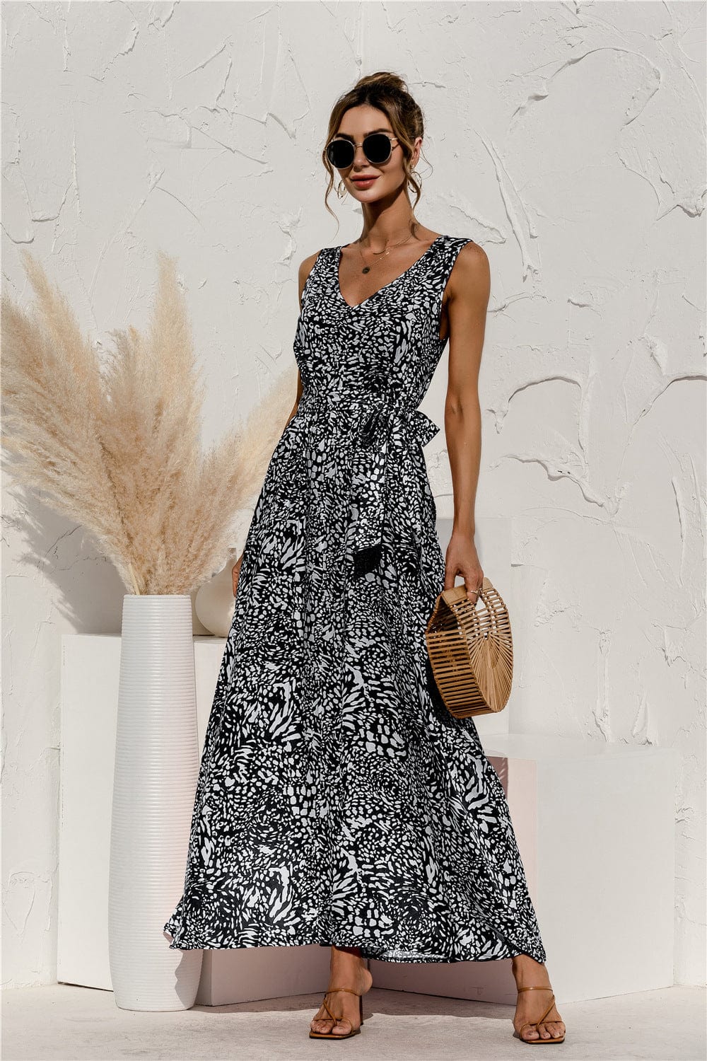 Vestido con cinturón y estampado animal
