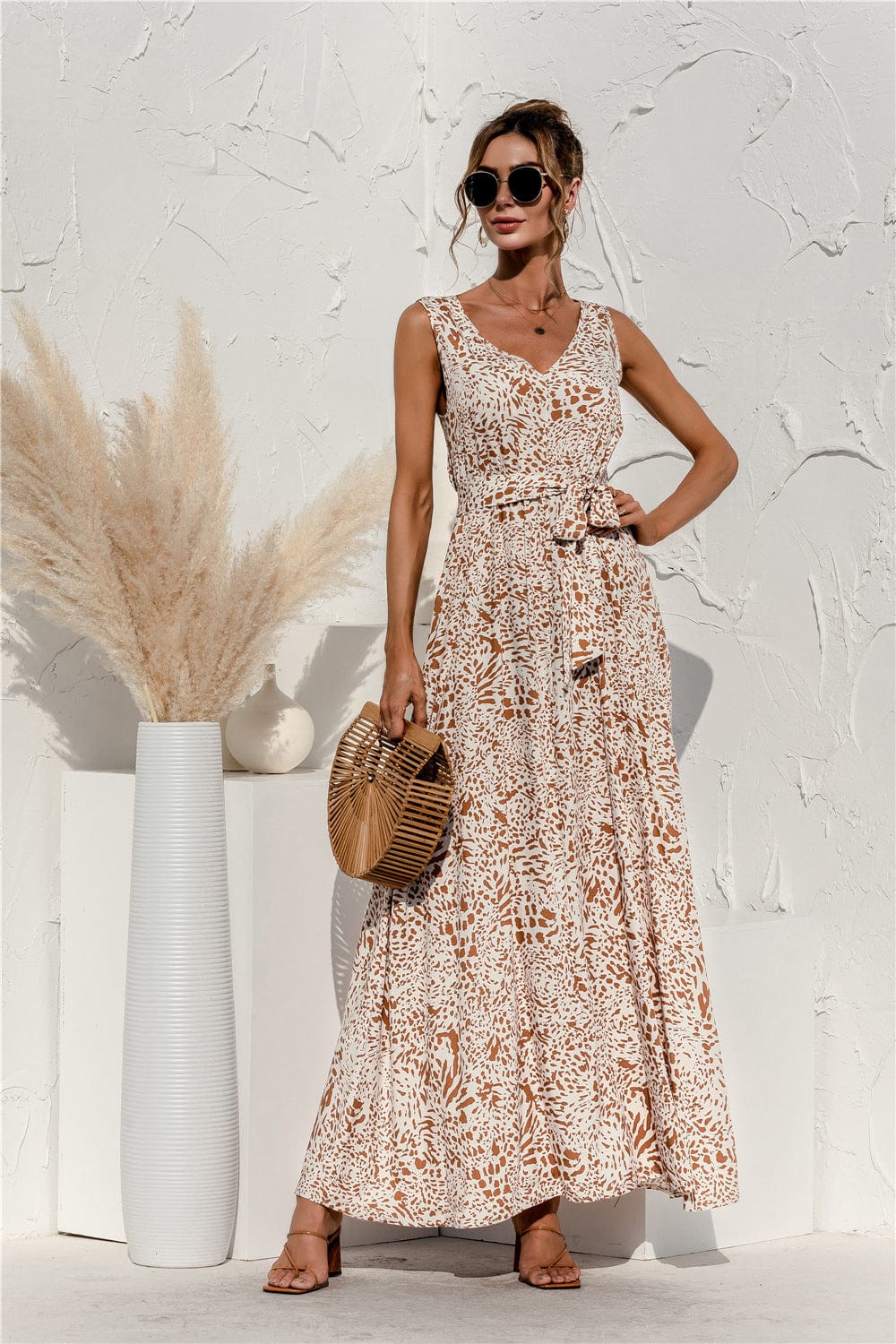 Vestido con cinturón y estampado animal