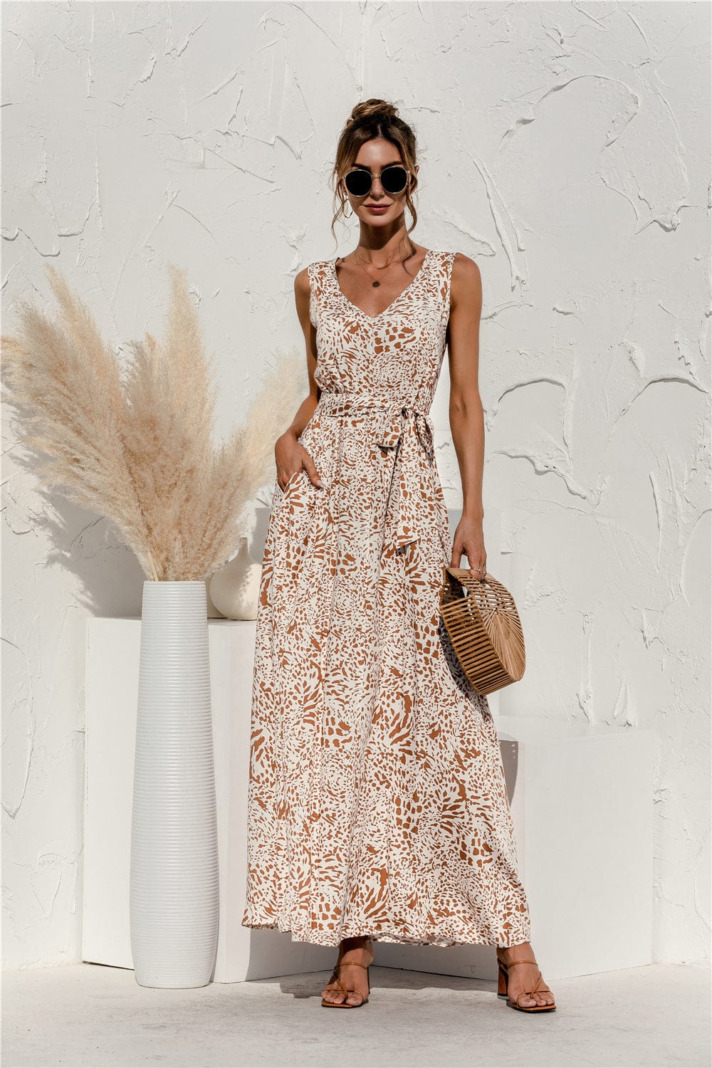 Vestido con cinturón y estampado animal