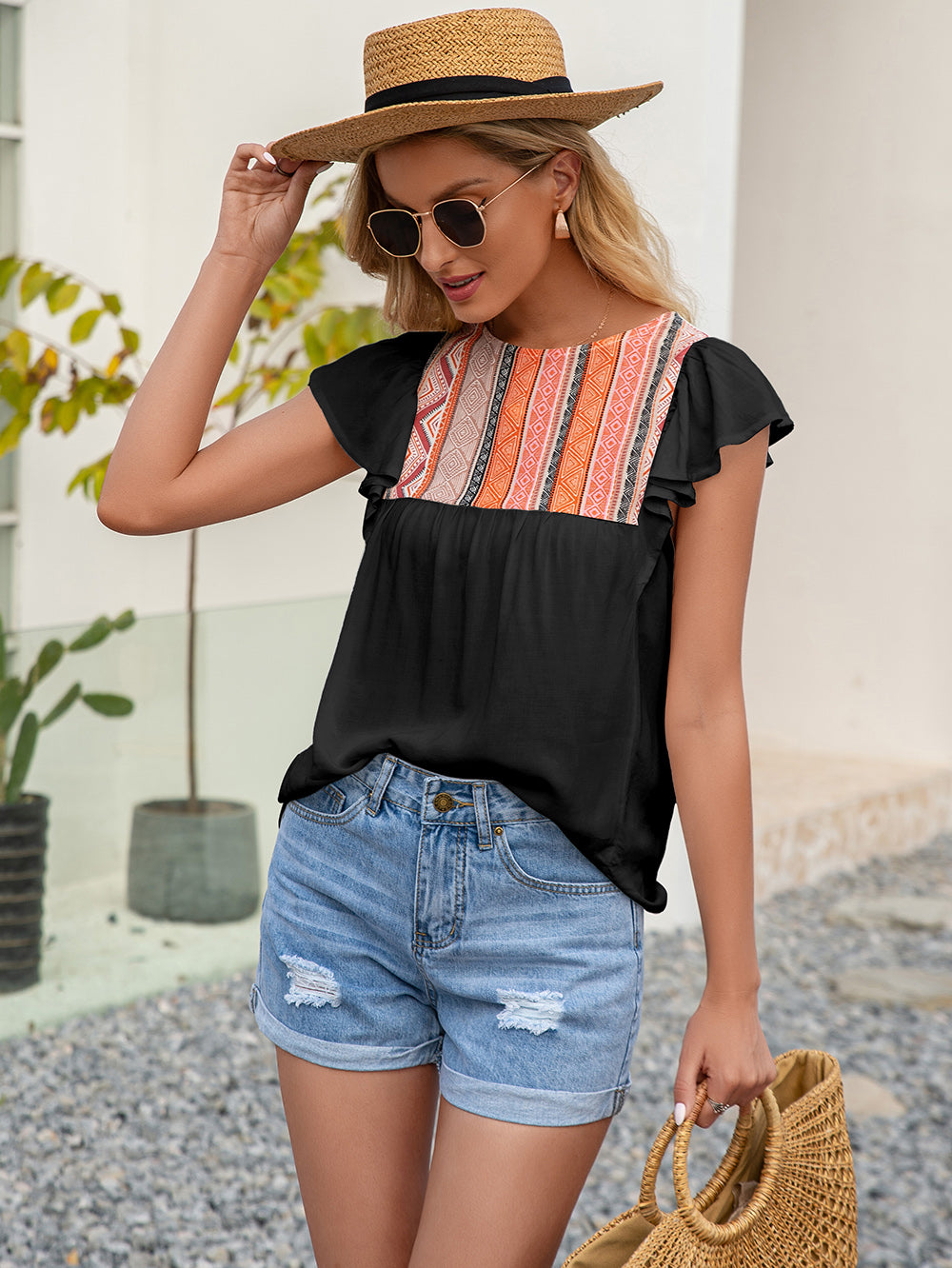 Blusa con volantes bordados