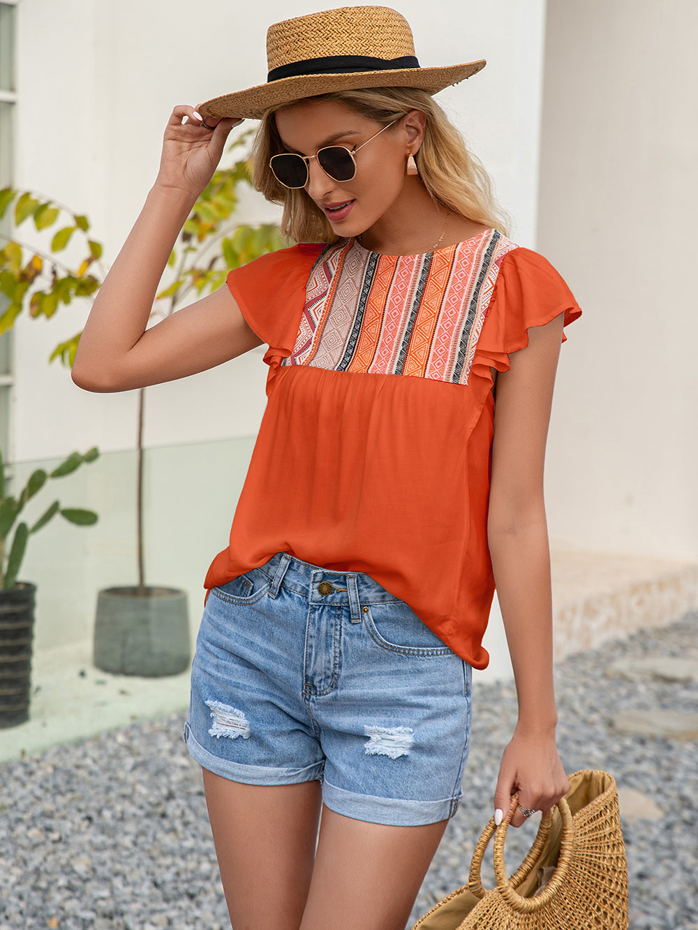 Blusa con volantes bordados