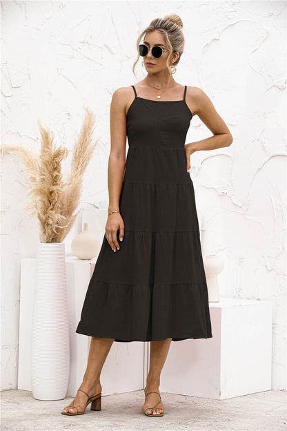 Vestido camisero con volantes y espalda abierta