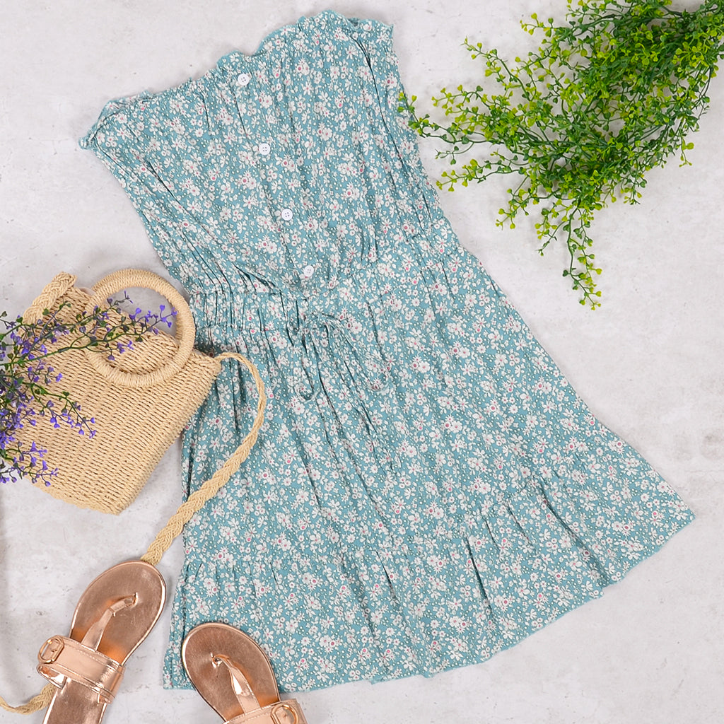 Vestido mini sin tirantes con botones y estampado floral de margaritas