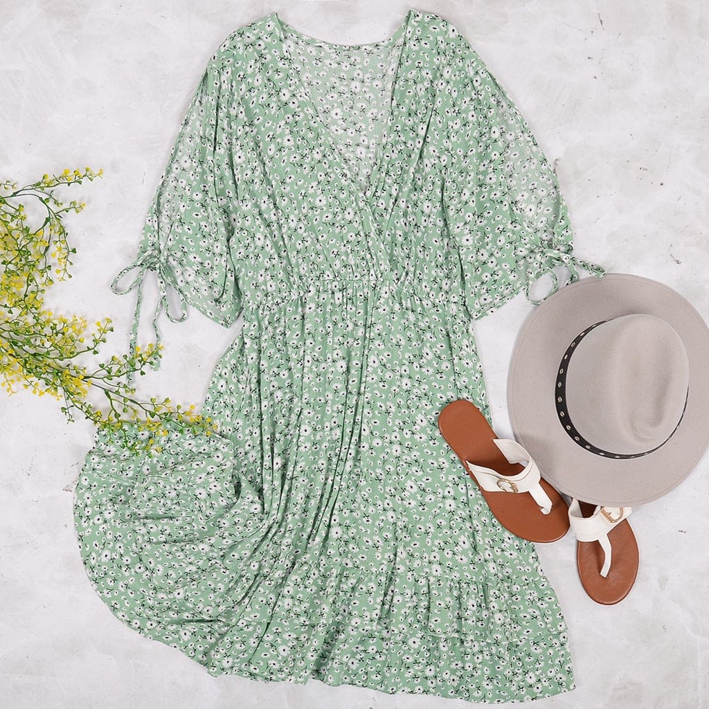 Vestido con estampado floral y mangas abiertas 