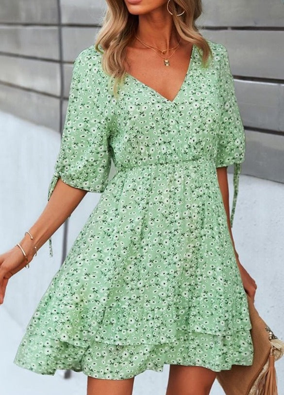 Vestido con estampado floral y mangas abiertas 