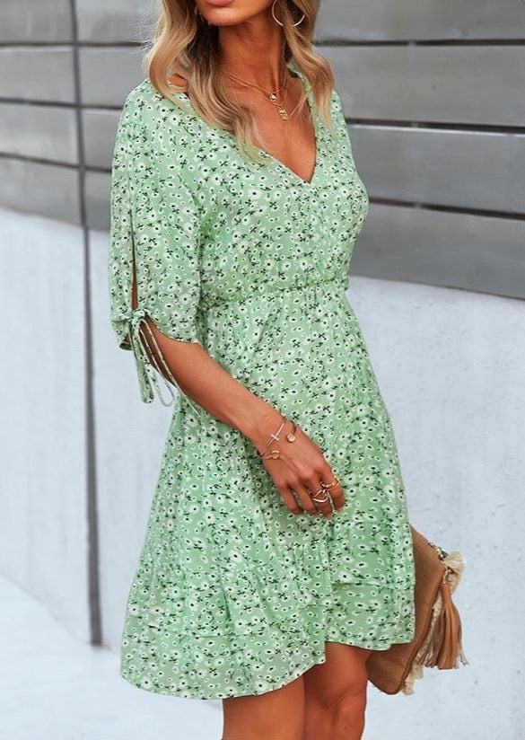 Vestido con estampado floral y mangas abiertas 