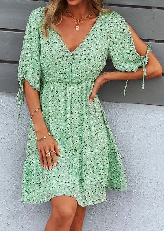 Vestido con estampado floral y mangas abiertas 