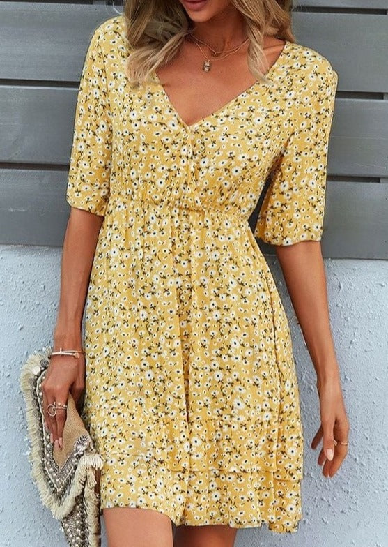 Vestido con estampado floral y mangas abiertas 