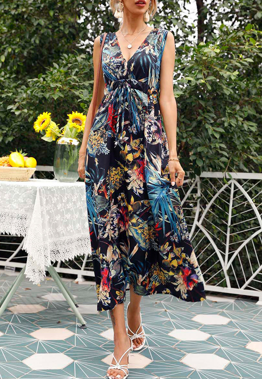 Vestido con estampado tropical y lazo en la espalda