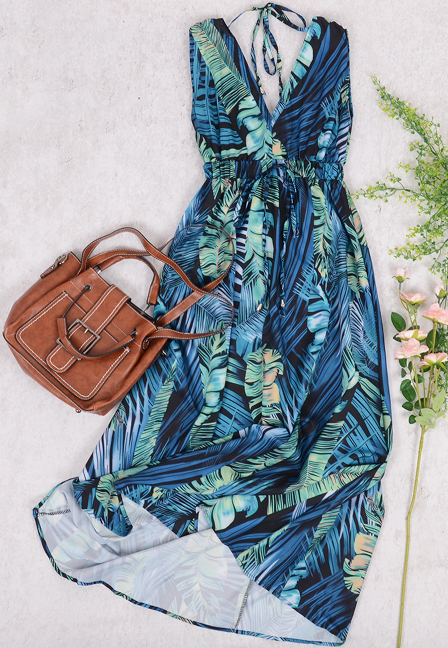 Vestido con estampado tropical y lazo en la espalda