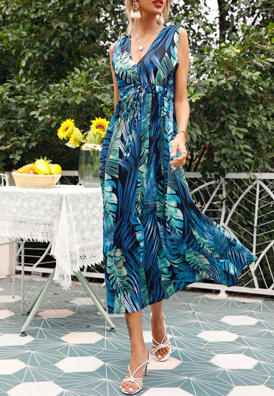Vestido con estampado tropical y lazo en la espalda