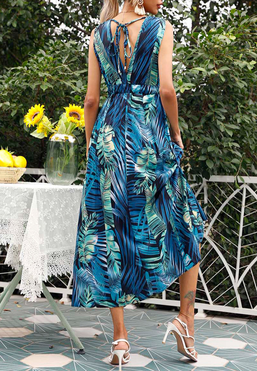 Vestido con estampado tropical y lazo en la espalda