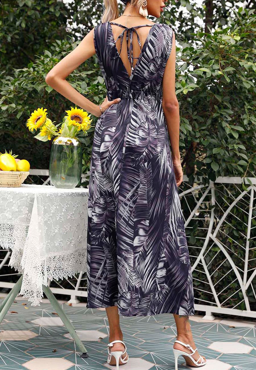 Vestido con estampado tropical y lazo en la espalda