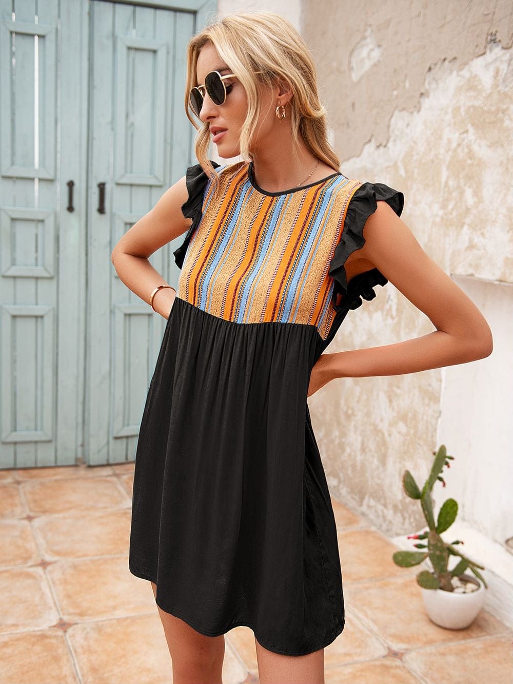 Vestido túnica con mangas con volantes 