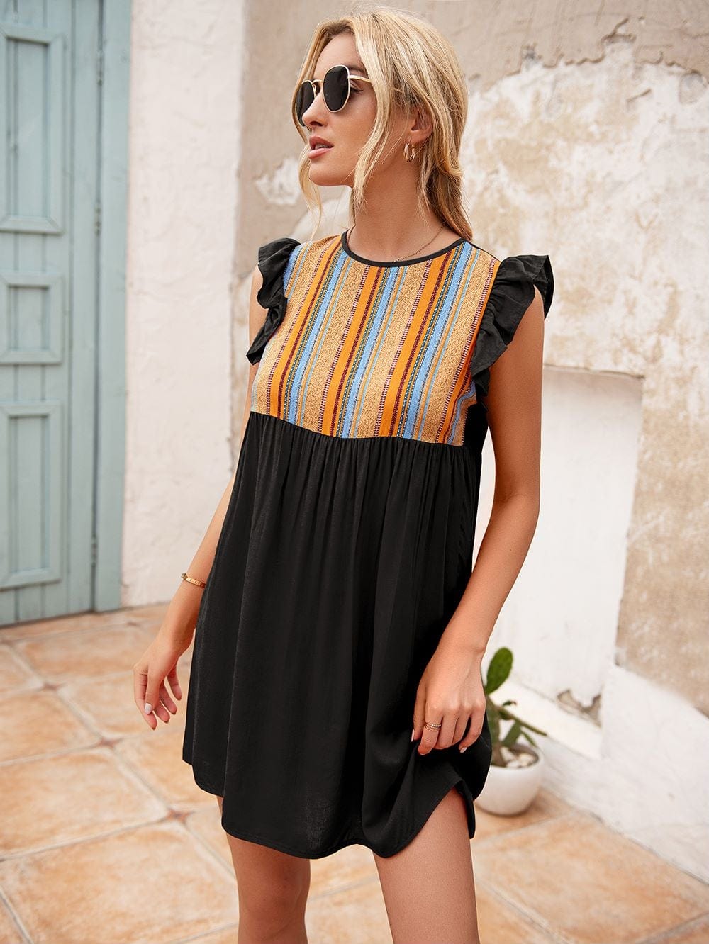 Vestido túnica con mangas con volantes 