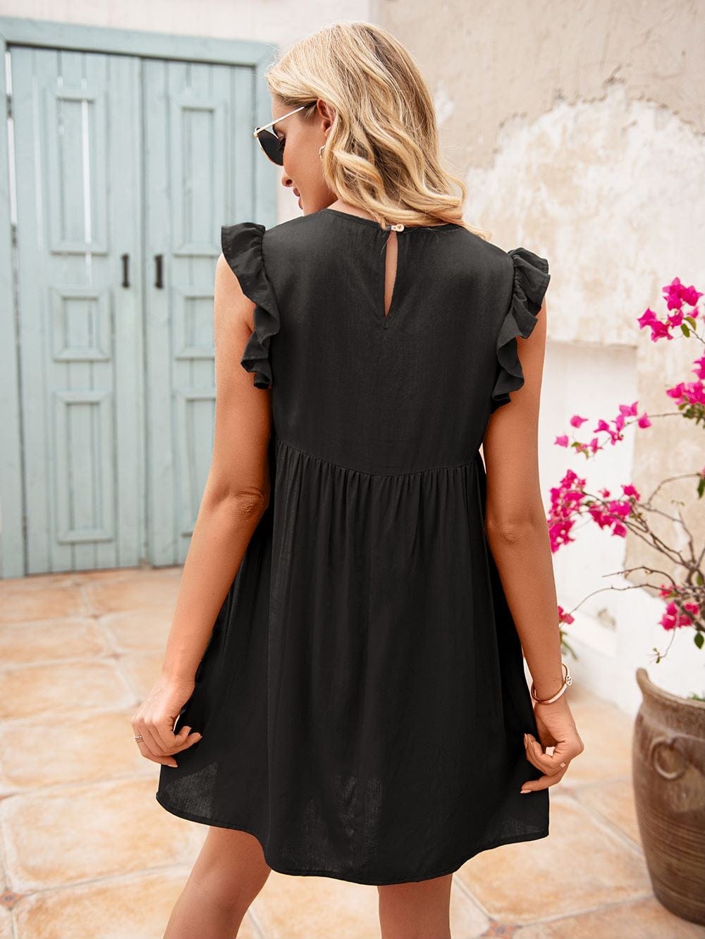 Vestido túnica con mangas con volantes 