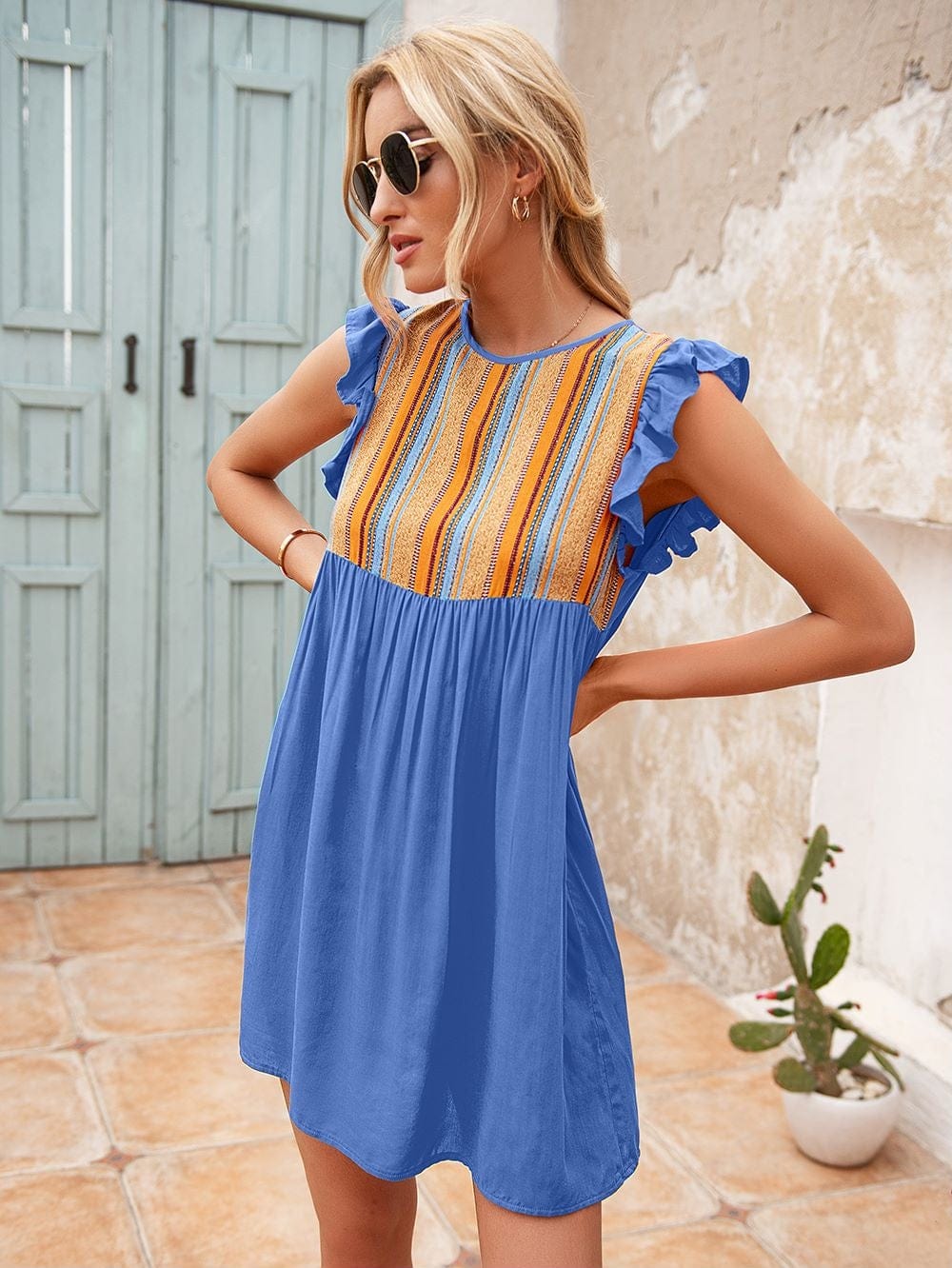 Vestido túnica con mangas con volantes 