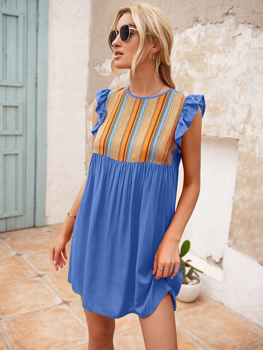 Vestido túnica con mangas con volantes 