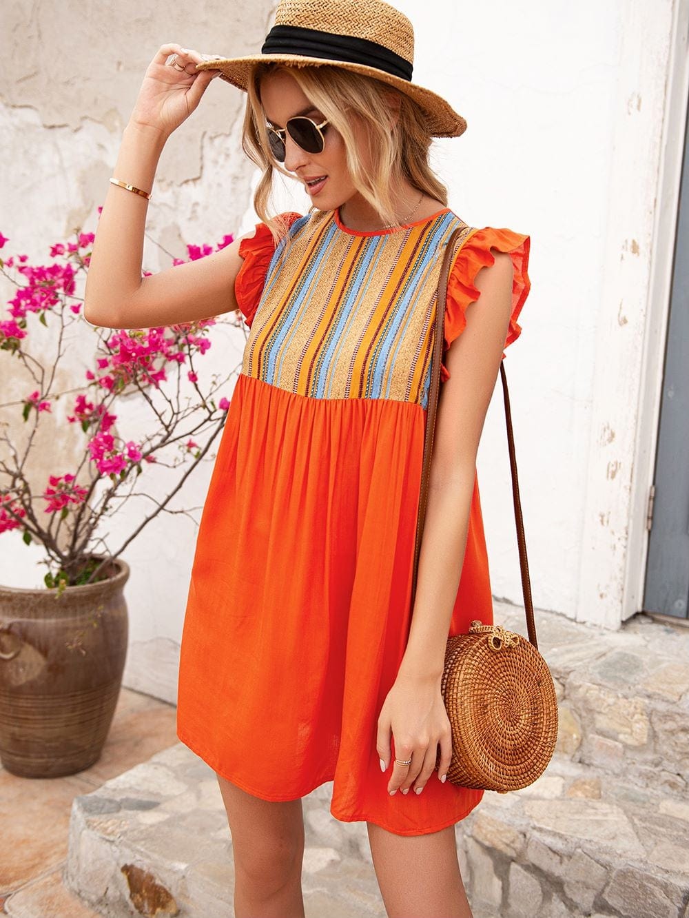 Vestido túnica con mangas con volantes 