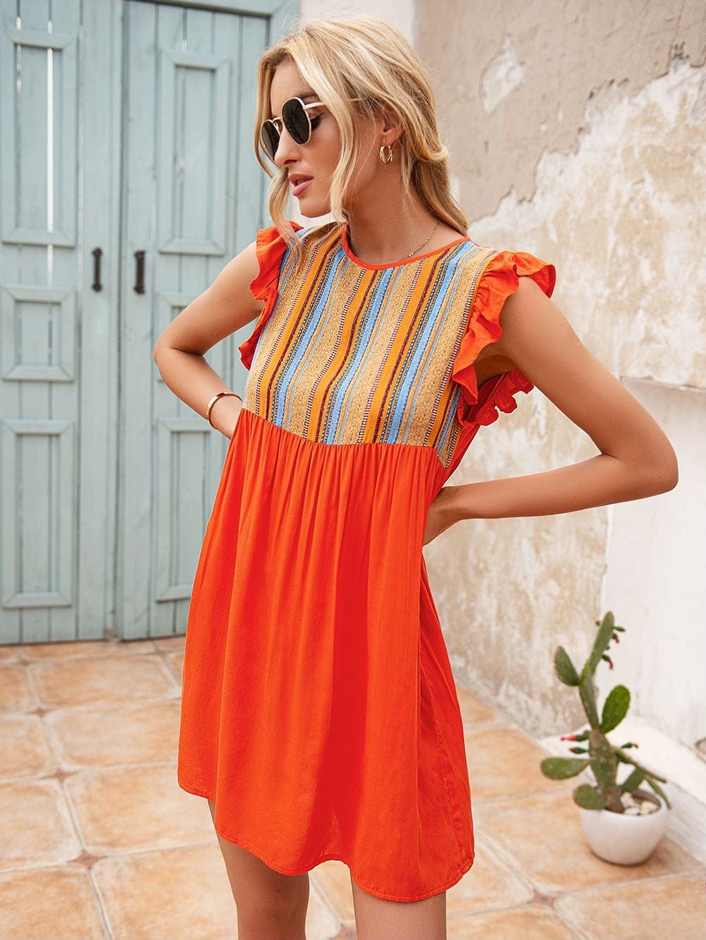Vestido túnica con mangas con volantes 