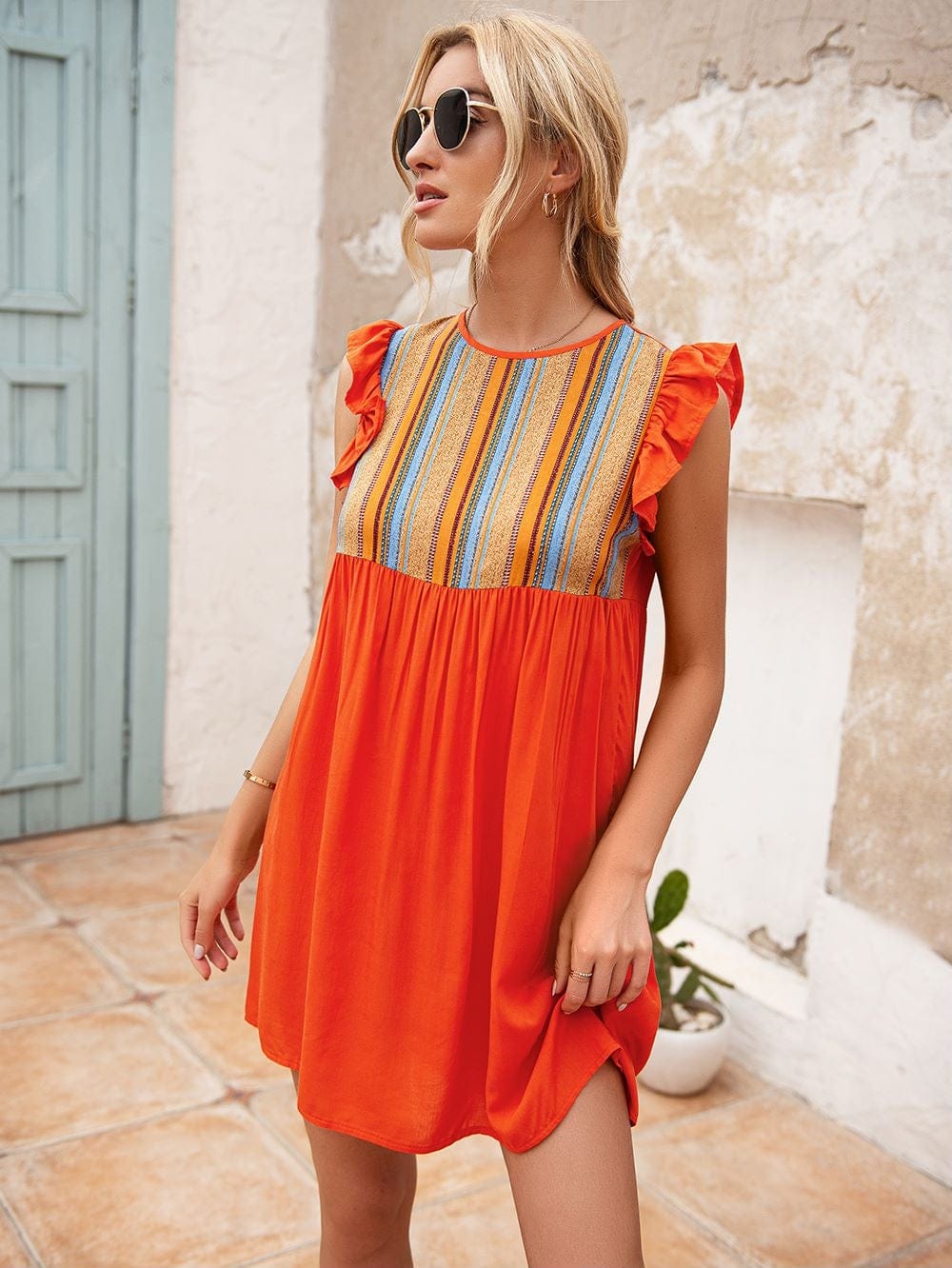 Vestido túnica con mangas con volantes 