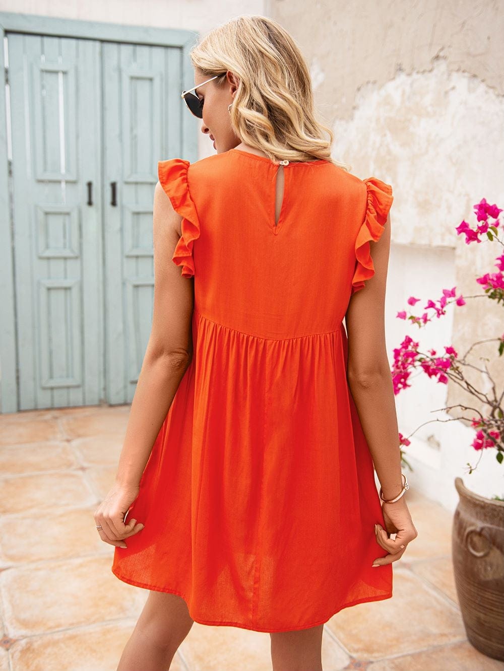 Vestido túnica con mangas con volantes 