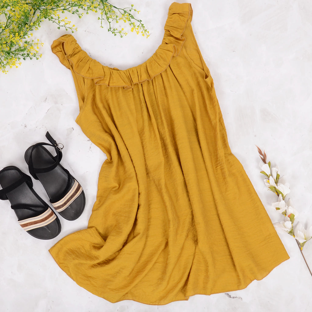 Vestido túnica con tirantes y volantes