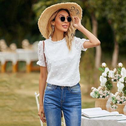 Blusa de lunares con pinza y mangas abullonadas