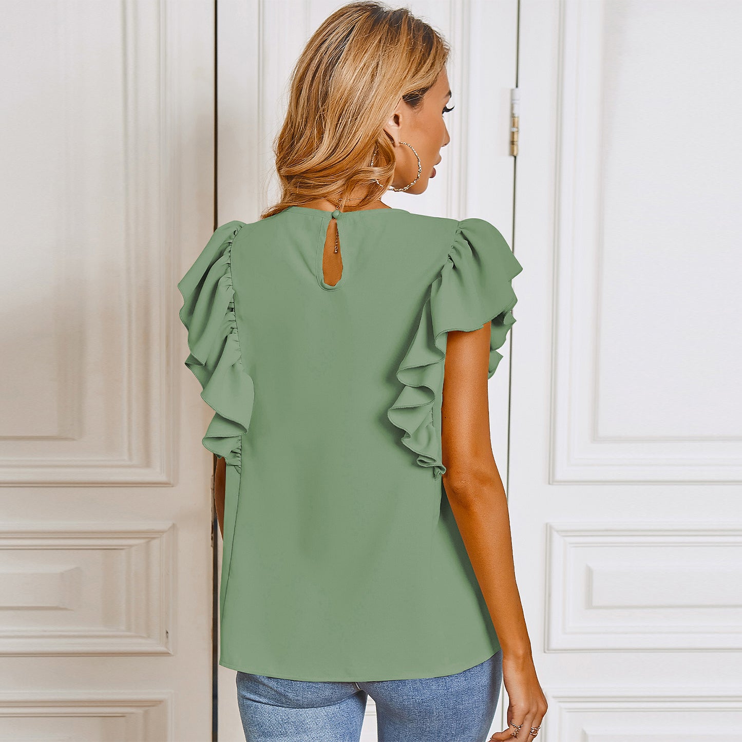 Blusa sin mangas con detalle de volantes