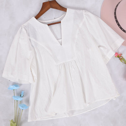 Blusa con escote en V y mangas abullonadas