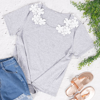 Camisa de verano con cuello redondo y manga corta con estampado floral