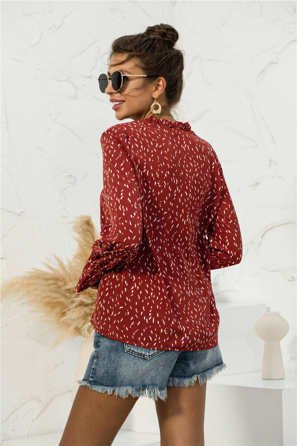 Blusa con mangas abullonadas y estampado suave