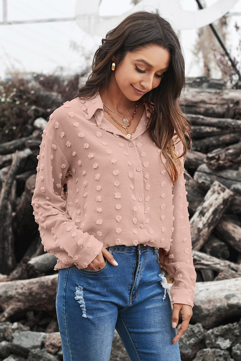 Blusa con cuello abotonado y puntos con clip