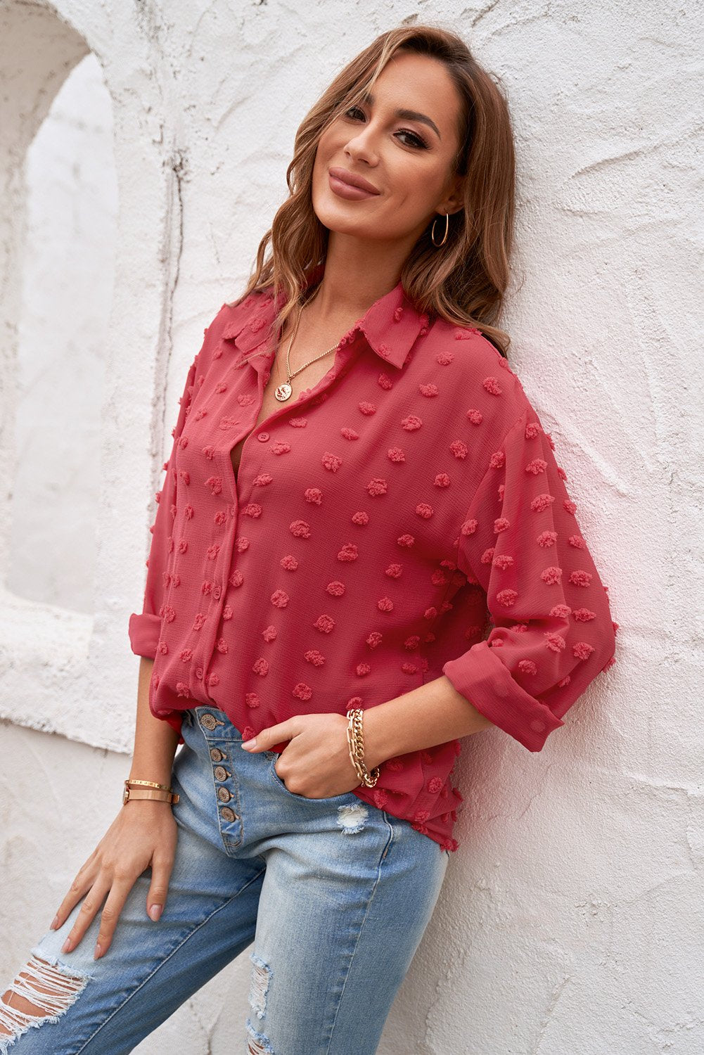 Blusa con cuello abotonado y puntos con clip