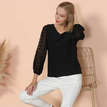 Blusa de manga larga con lunares y clip
