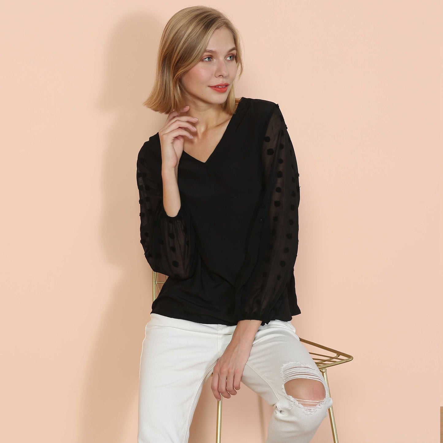 Blusa de manga larga con lunares y clip