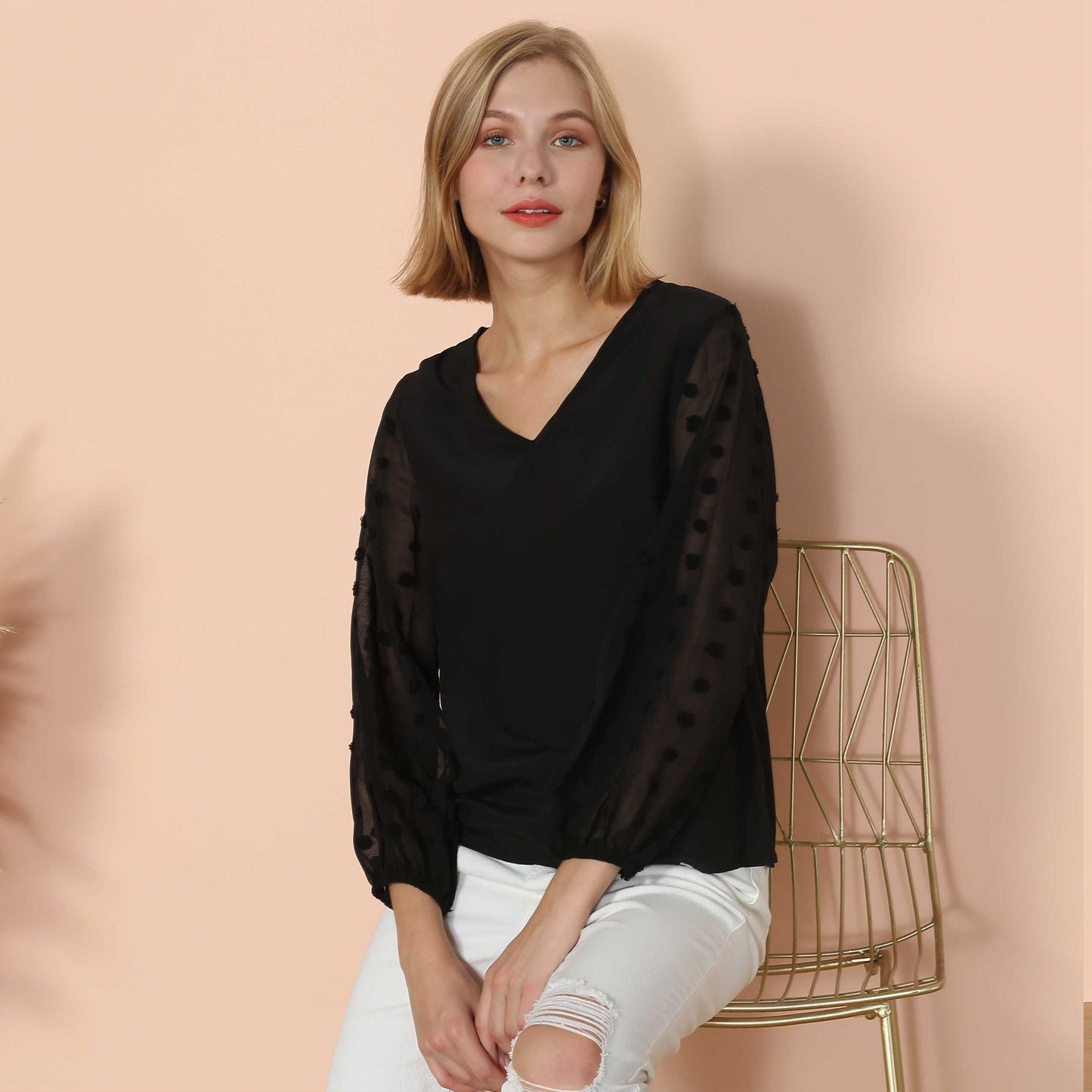Blusa de manga larga con lunares y clip
