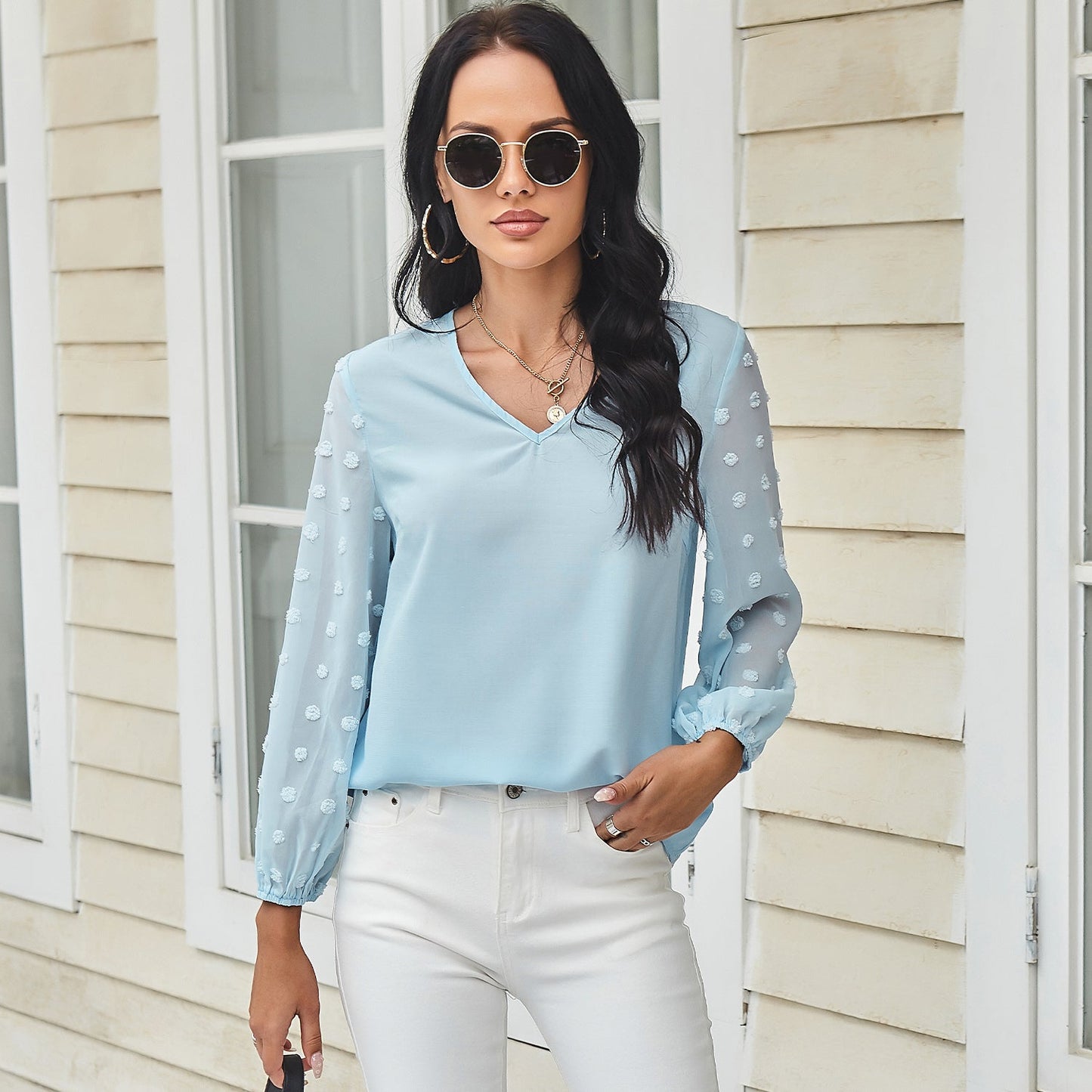 Blusa de manga larga con lunares y clip