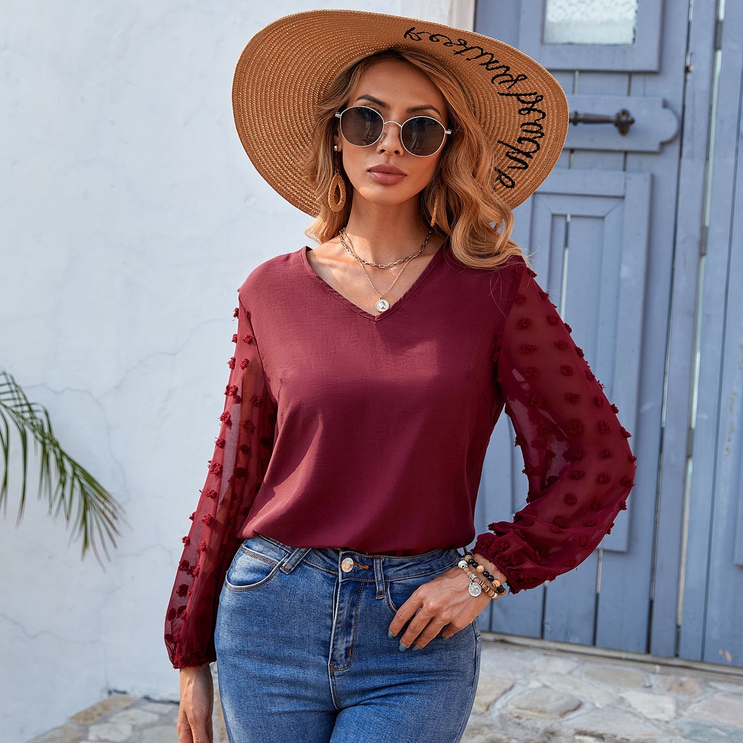 Blusa de manga larga con lunares y clip