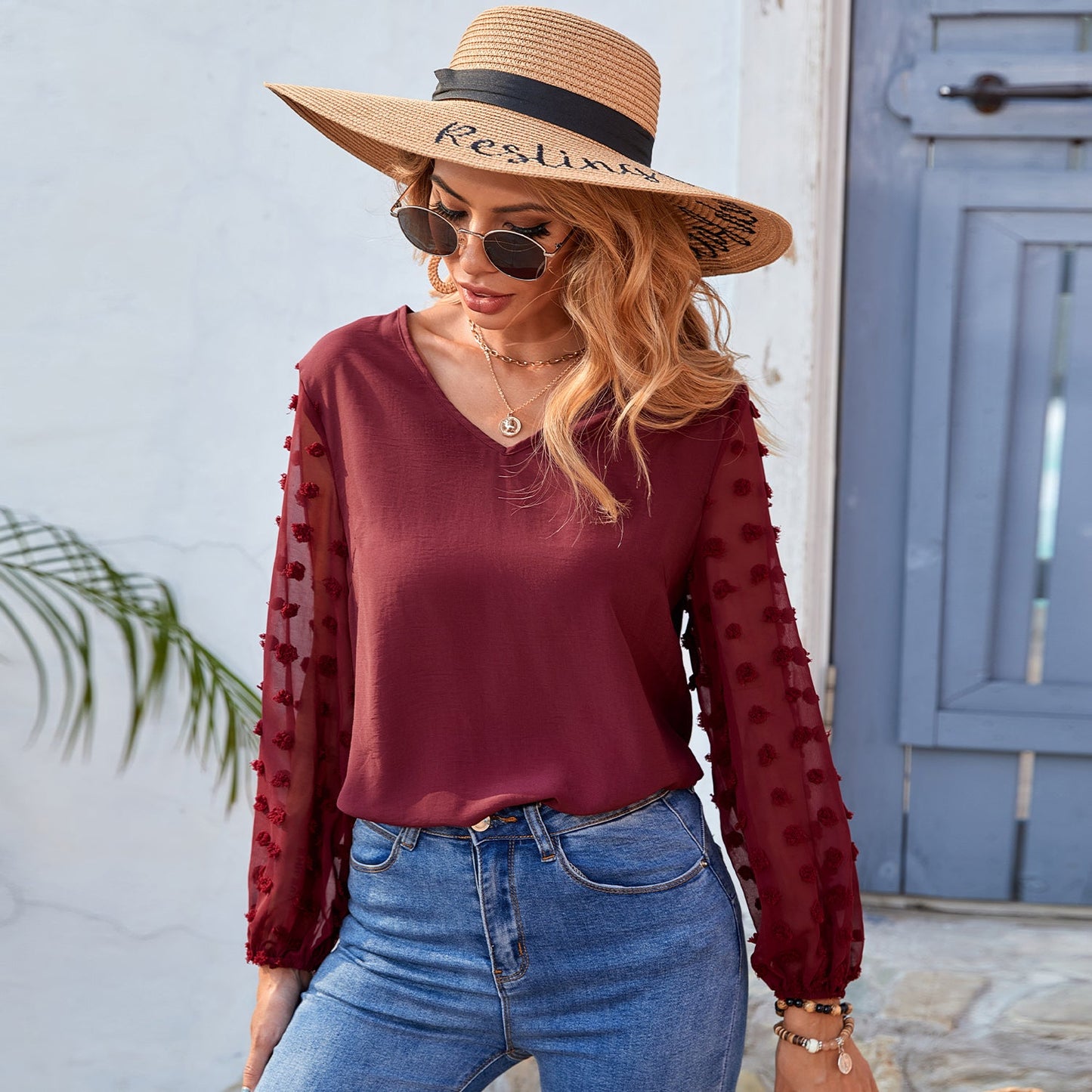 Blusa de manga larga con lunares y clip