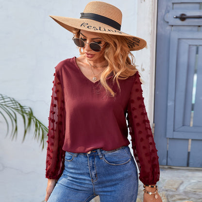 Blusa de manga larga con lunares y clip