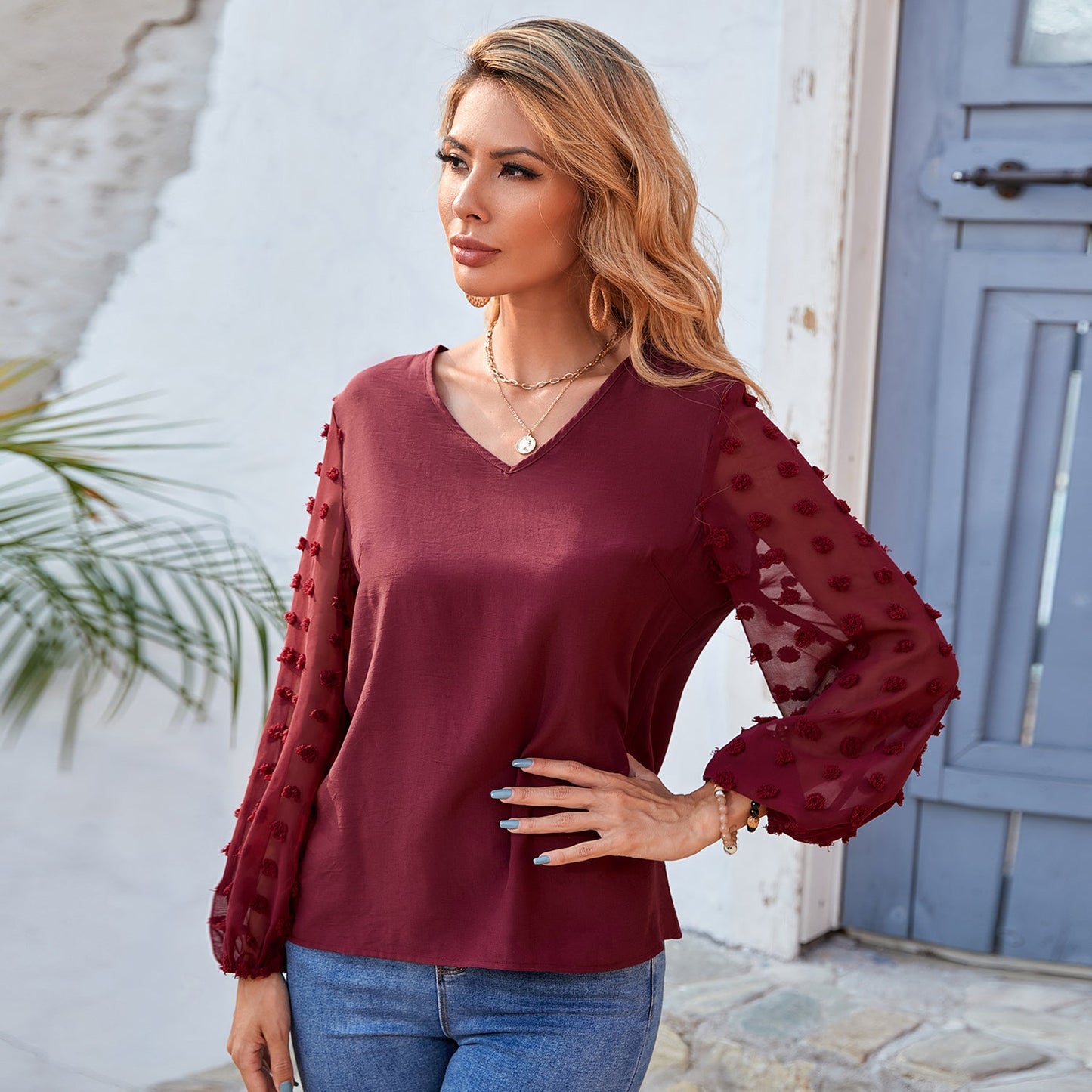 Blusa de manga larga con lunares y clip