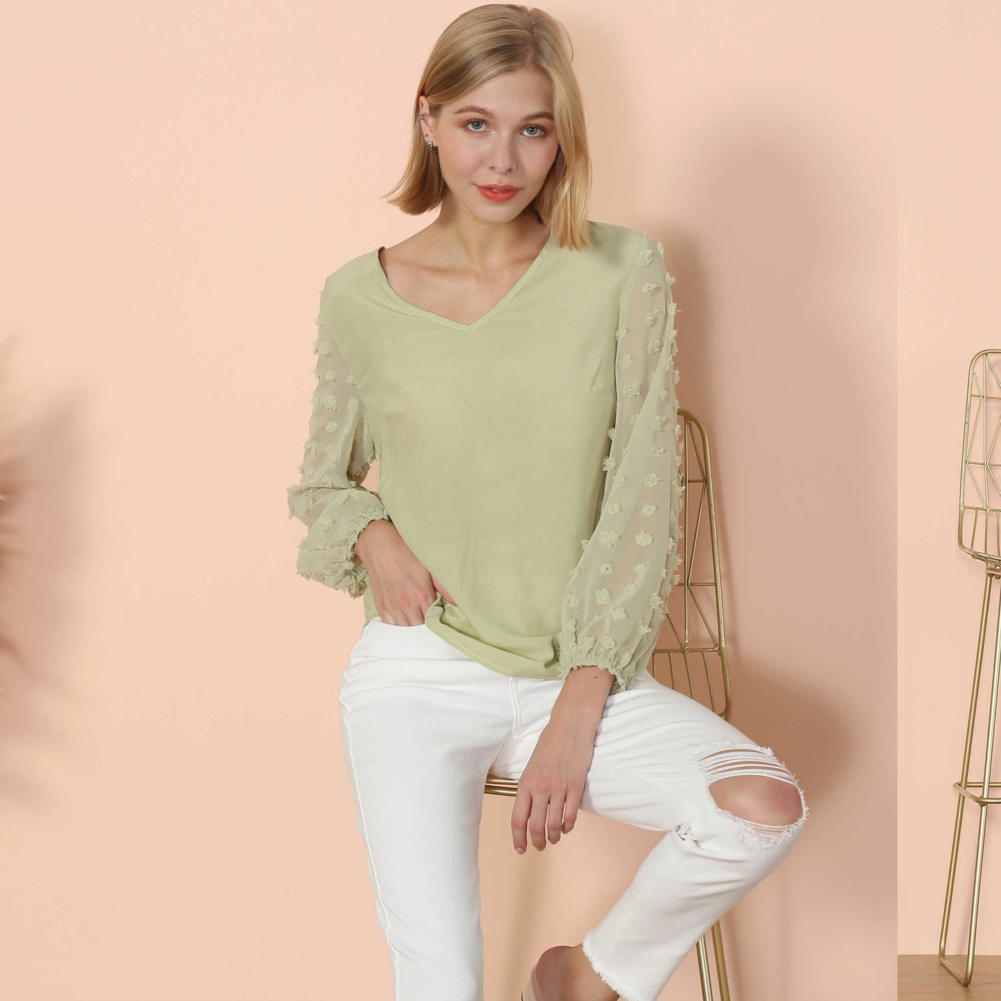 Blusa de manga larga con lunares y clip