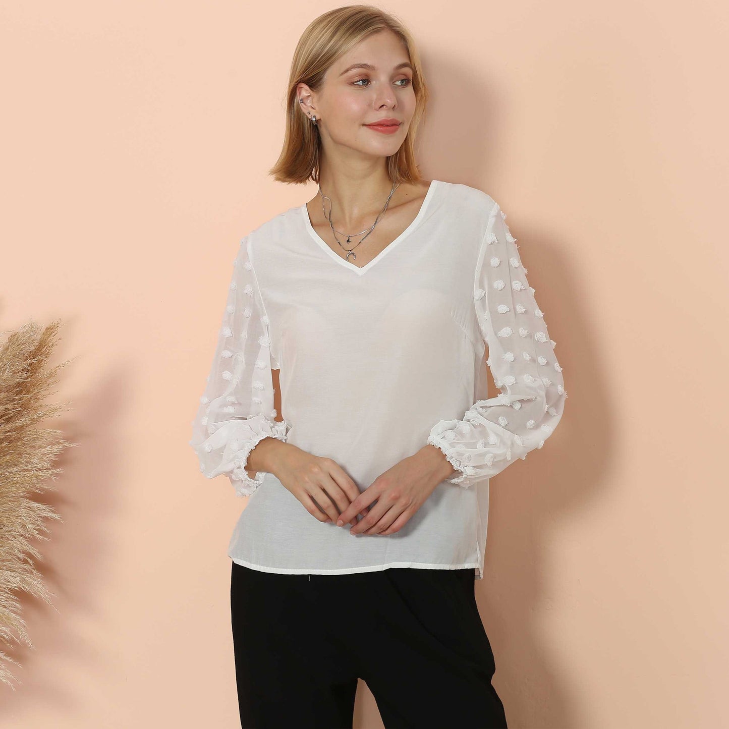 Blusa de manga larga con lunares y clip