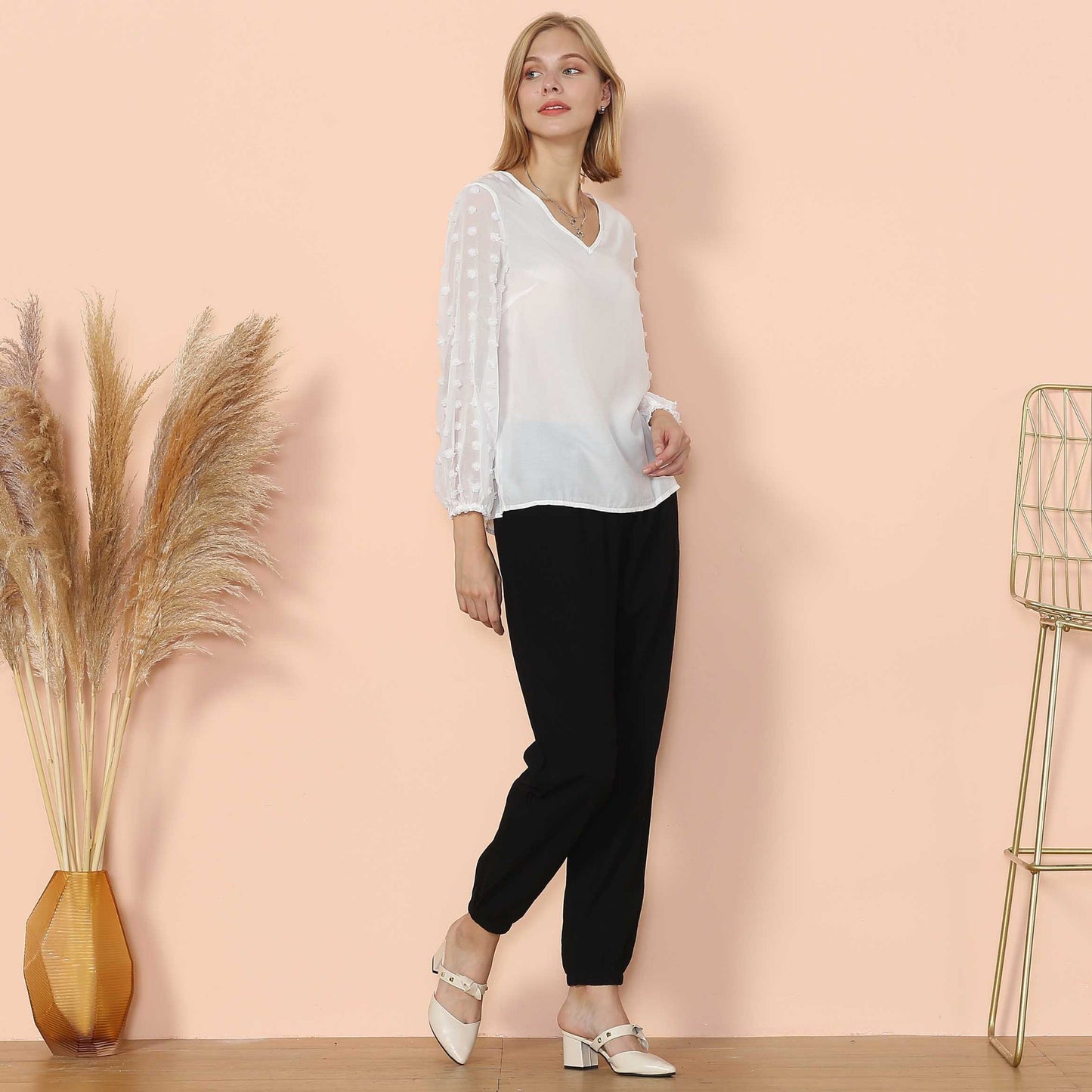Blusa de manga larga con lunares y clip