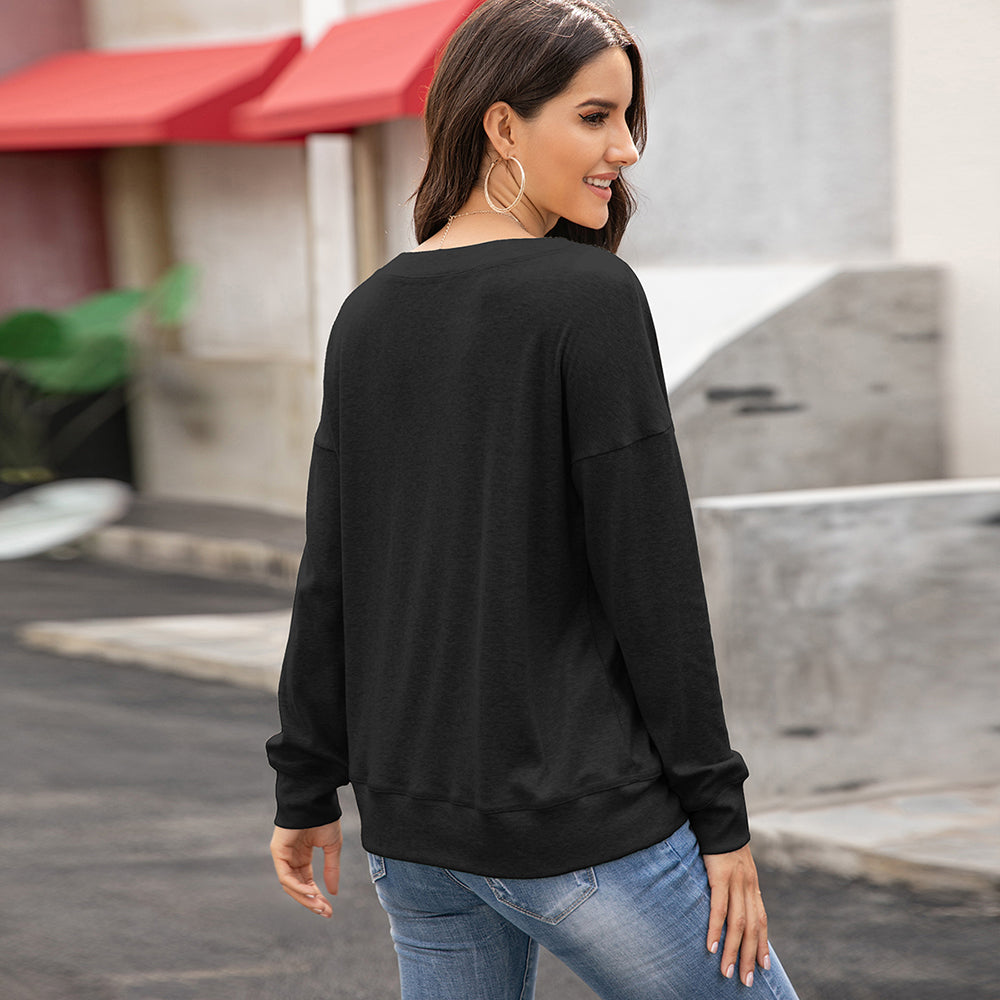 Blusa de manga larga con botones y diseño lujoso
