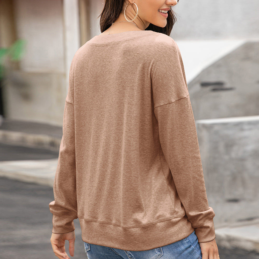 Blusa de manga larga con botones y diseño lujoso